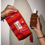beach pouch with tanning oil